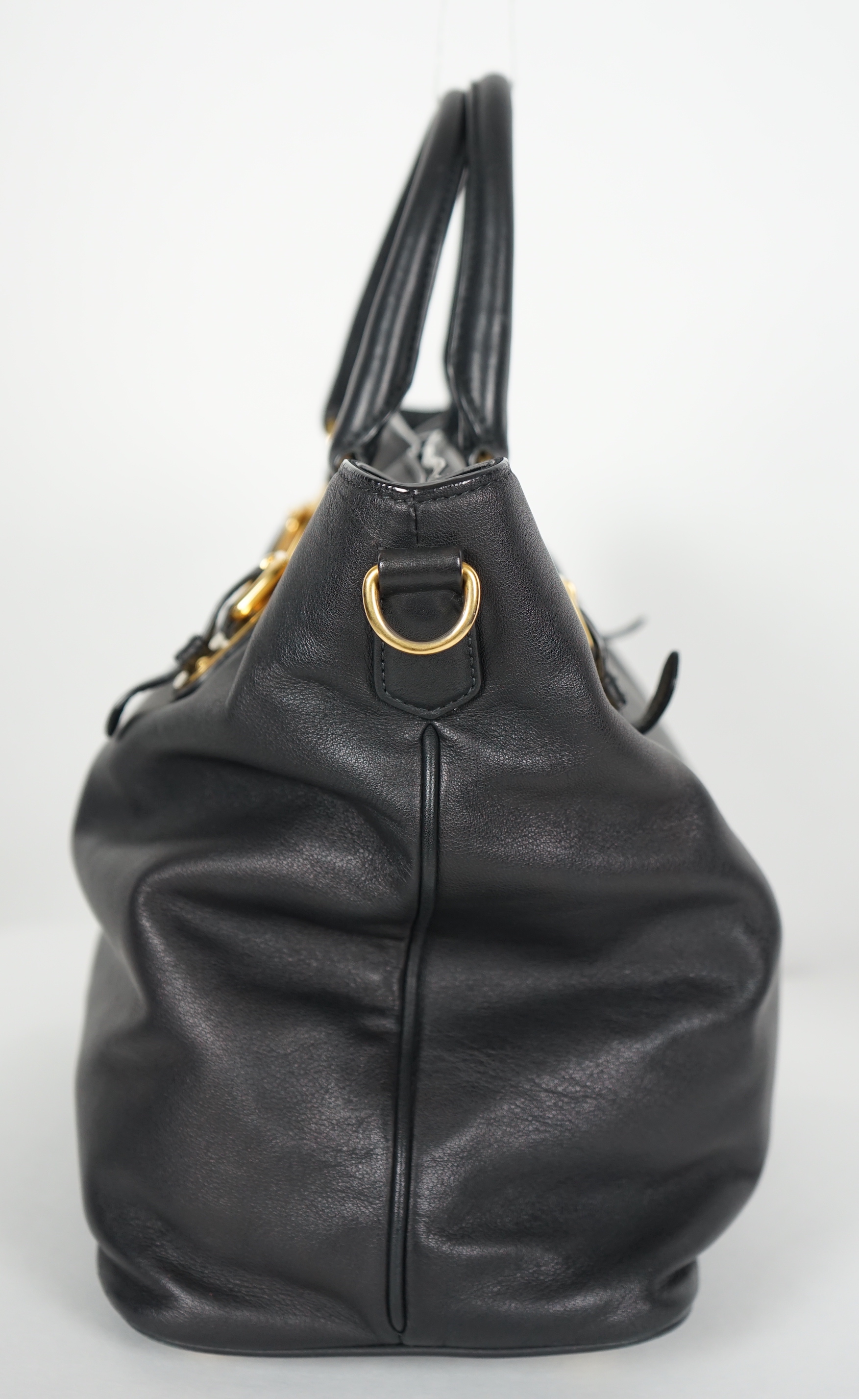 A Prada Vitello black leather bag with detachable strap, width 40cm, max heigh 27cm, depth 17cm